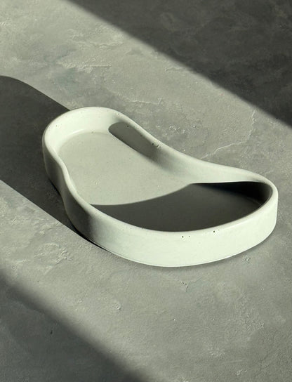 padėklas aukštais kraštais // lašas.